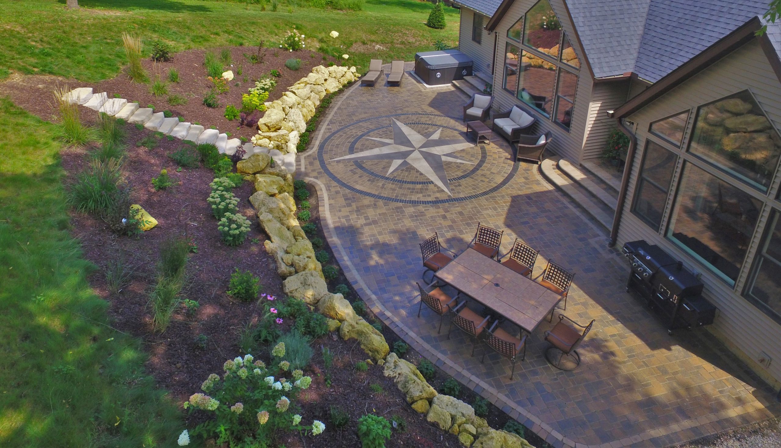 unique paver patio and retaining wall